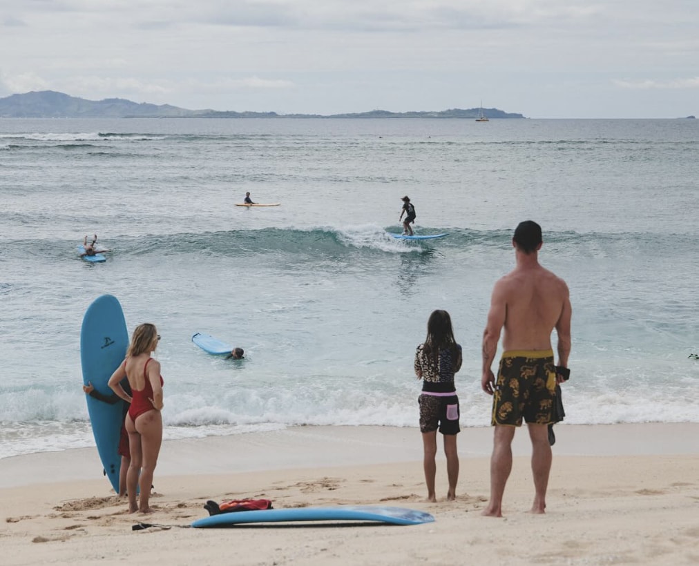 Hemsworth and Pataky went surfing with all of their kids