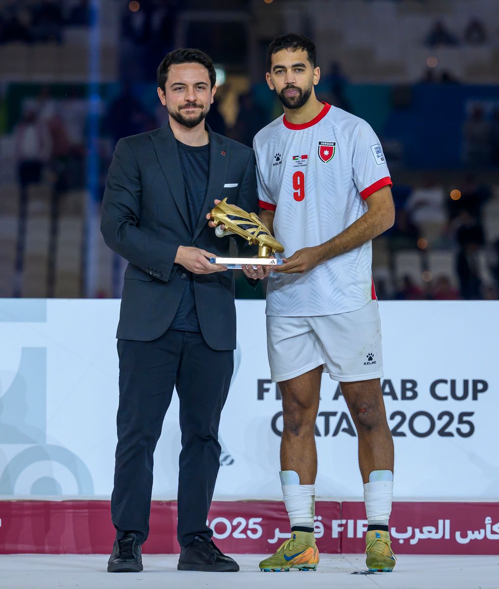 Ali Olwan of Jordan receives the Golden Boot Award from Hussein, Crown Prince of Jordan, after the FIFA Arab Cup 2025 final match between Jordan and Morocco at Lusail Stadium in Doha, Qatar, on December 18, 2025