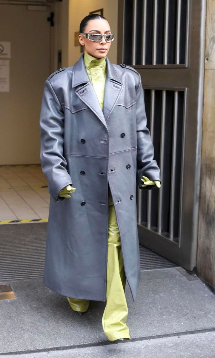 Kim Kardashian Stands Out In Green And Gray Leather As She Attends The Prada MFW Show