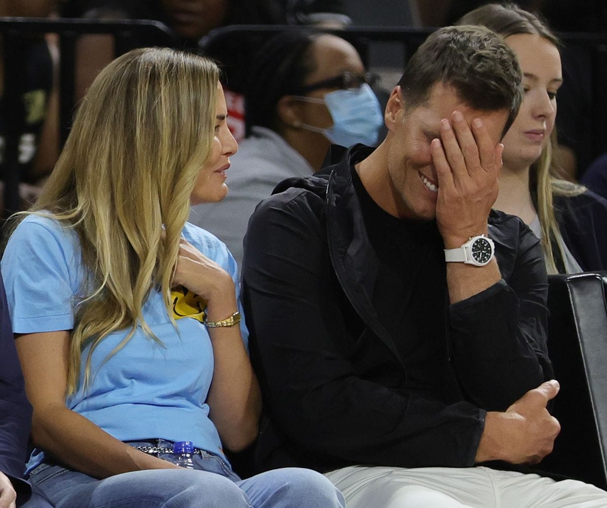 Julie and Tom Brady at a football game in 2022