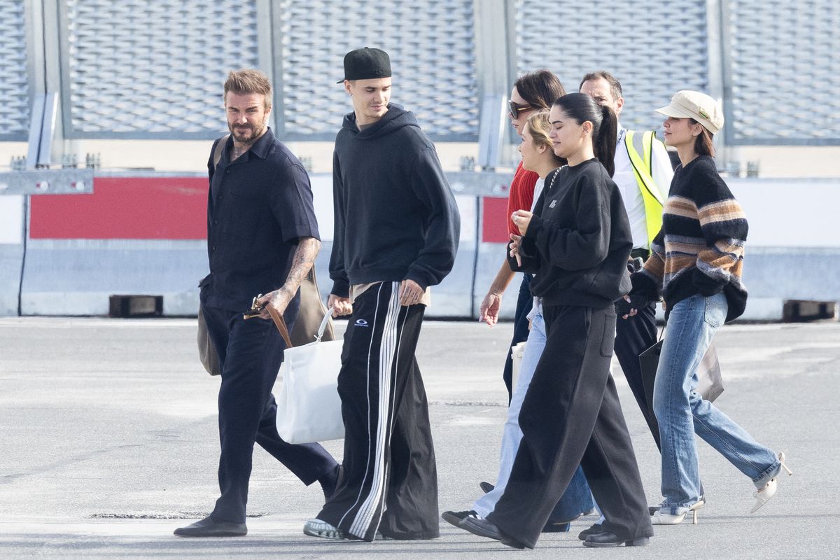 The Beckham family arrives at Paris-Le Bourget Airport ahead of the party with Jackie Apostel and Kim Turnbull