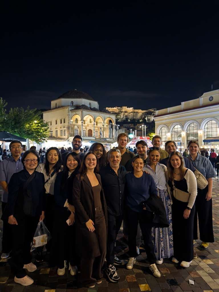 CookUnity contest winners and chefs gather in Monastiraki Square, Athens after an evening walking food tour