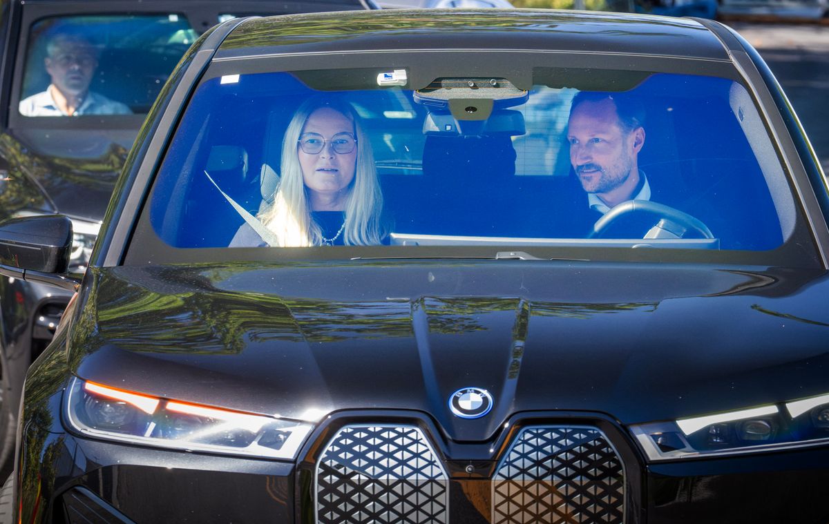 Crown Prince Haakon of Norway and Crown Princess Mette-Marit of Norway sit in a car as they leave the Rikshospitalet hospital, where King Harald V of Norway is hospitalized, on August 25, 2026.