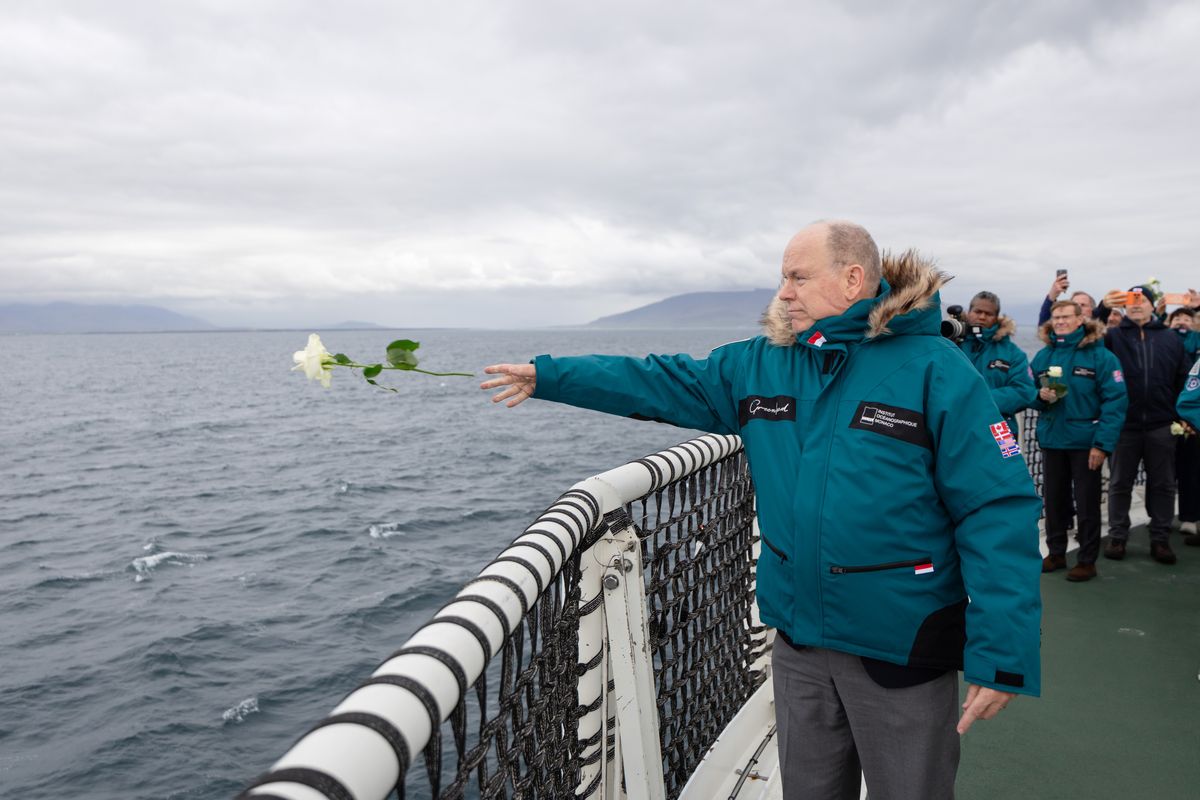 Prince Albert II and Princess Charlène paid tribute to legendary explorer Jean-Baptiste Charcot by releasing white roses into the ocean during an emotional ceremony off the coast of Iceland.