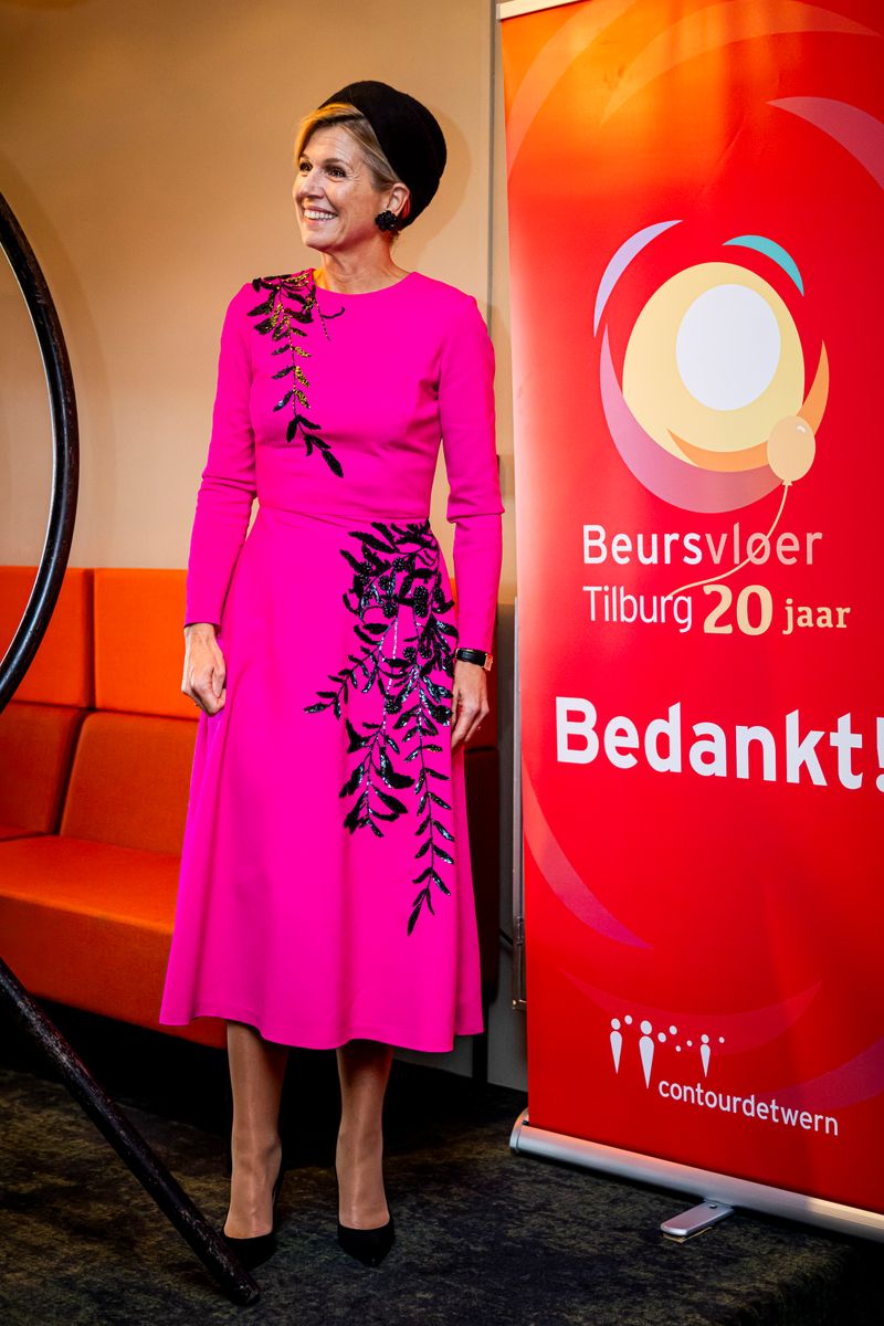 Máxima finished the look with classic black pointed stilettos and bold black accessories