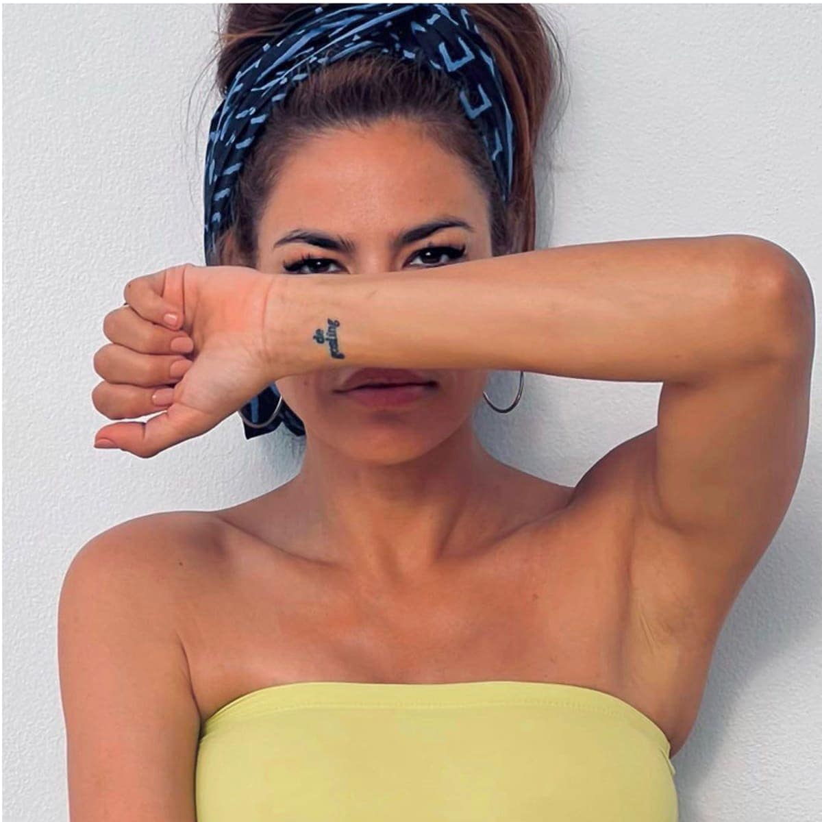 Eva's wrist tattoo