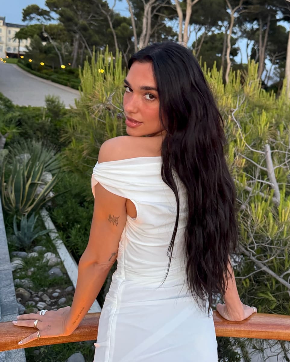 Dua Lipa poses in white bridal dress amid engagement to Callum Turner