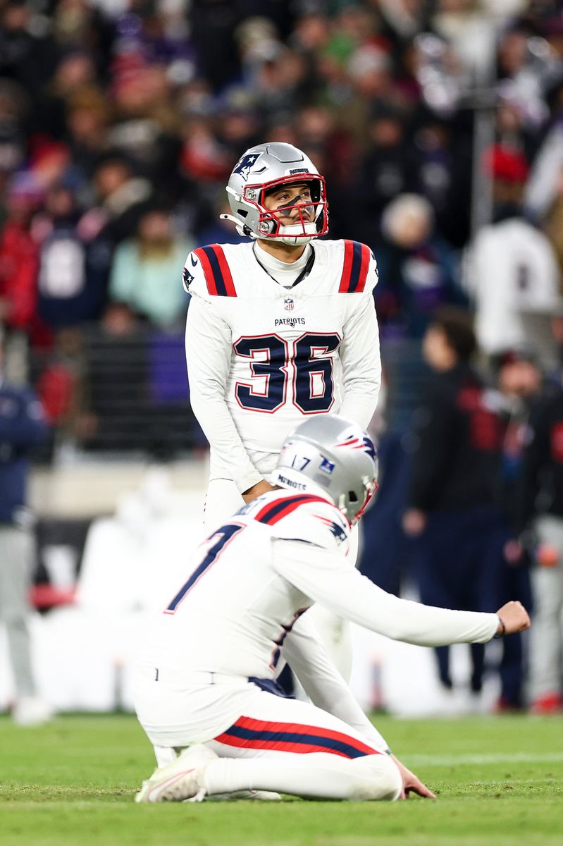 Andy Borregales #36 of the New England Patriots prepares to kick a field goal during an NFL football game against the Baltimore Ravens.