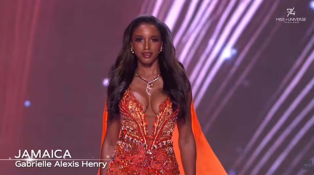 At the moment of the accident, Miss Jamaica was wearing a long orange gown with sparkling embellishments and a high slit.