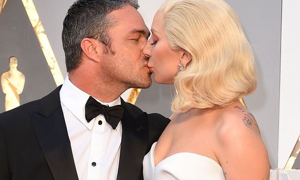 February 2016: Gaga planted a kiss on her leading man during the 88th Annual Academy Awards.
<br>
Photo: Getty Images