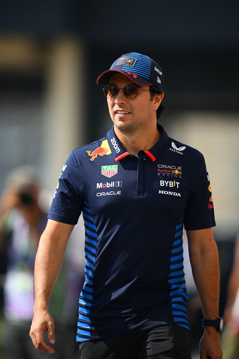 Sergio Perez of Mexico and Oracle Red Bull Racing walks in the Paddock prior to practice ahead of the F1 Grand Prix of Abu Dhabi at Yas Marina Circuit on December 06, 2024 in Abu Dhabi, United Arab Emirates. (Photo by Clive Mason/Getty Images)