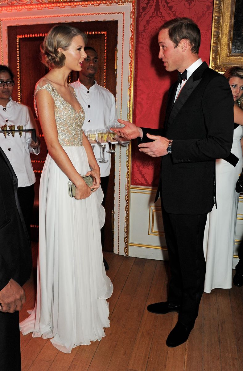 Taylor Swift (L) and Prince William on November 26, 2013 in London, England.