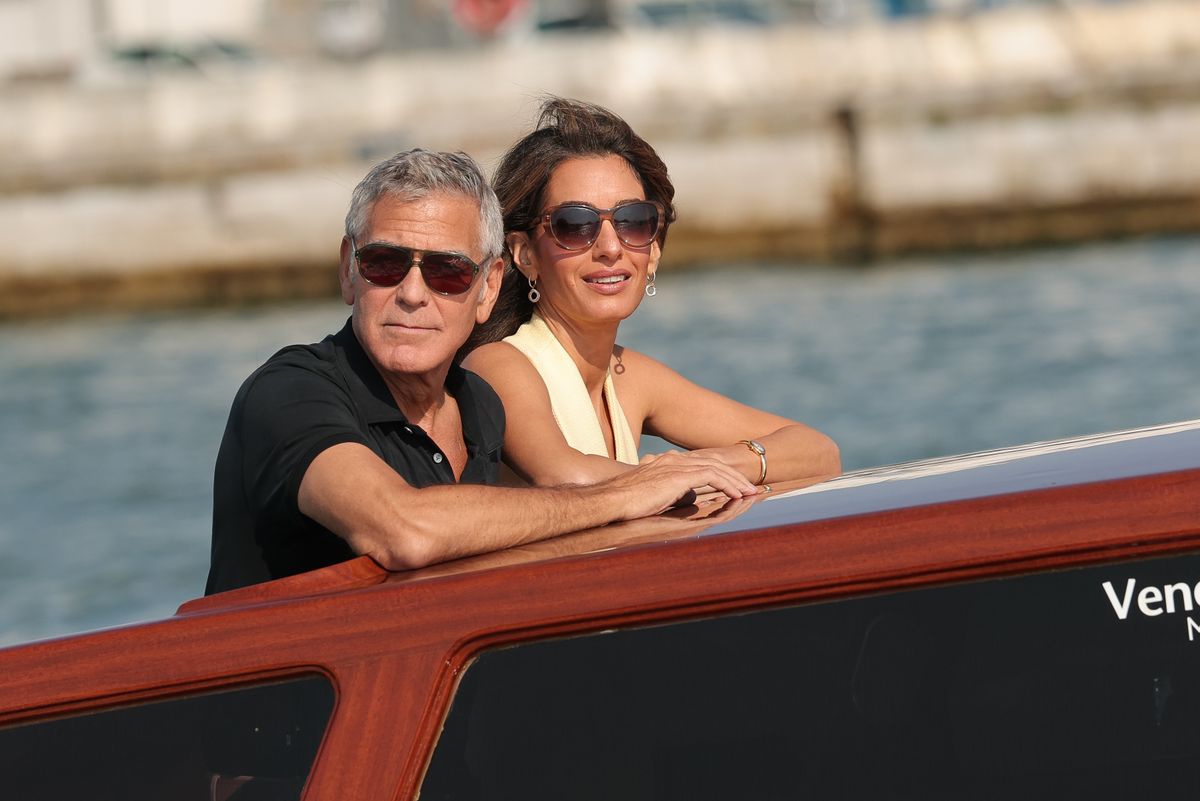 Amal Clooney and George Clooney are seen arriving ahead of the 82nd Venice International Film Festival 2025 on August 26, 2025 in Venice, Italy.