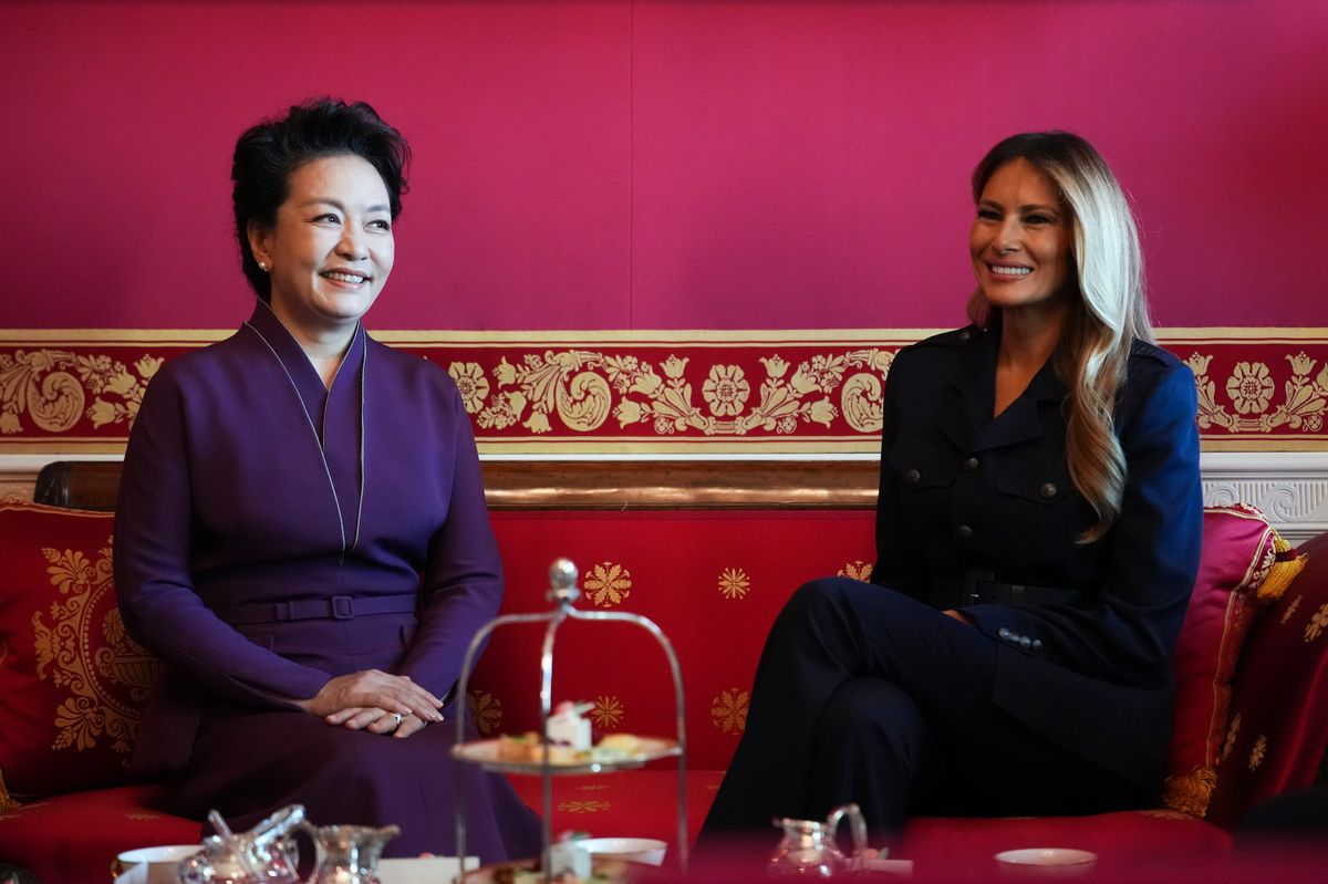 Peng Liyuan and Melania Trump attend a tea ceremony in the Red Room of the White House on September 25, 2026