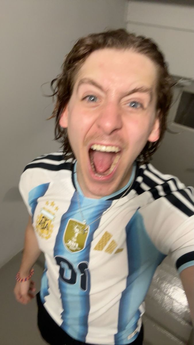 James was celebrating the teams win while supporting Messi's jersey