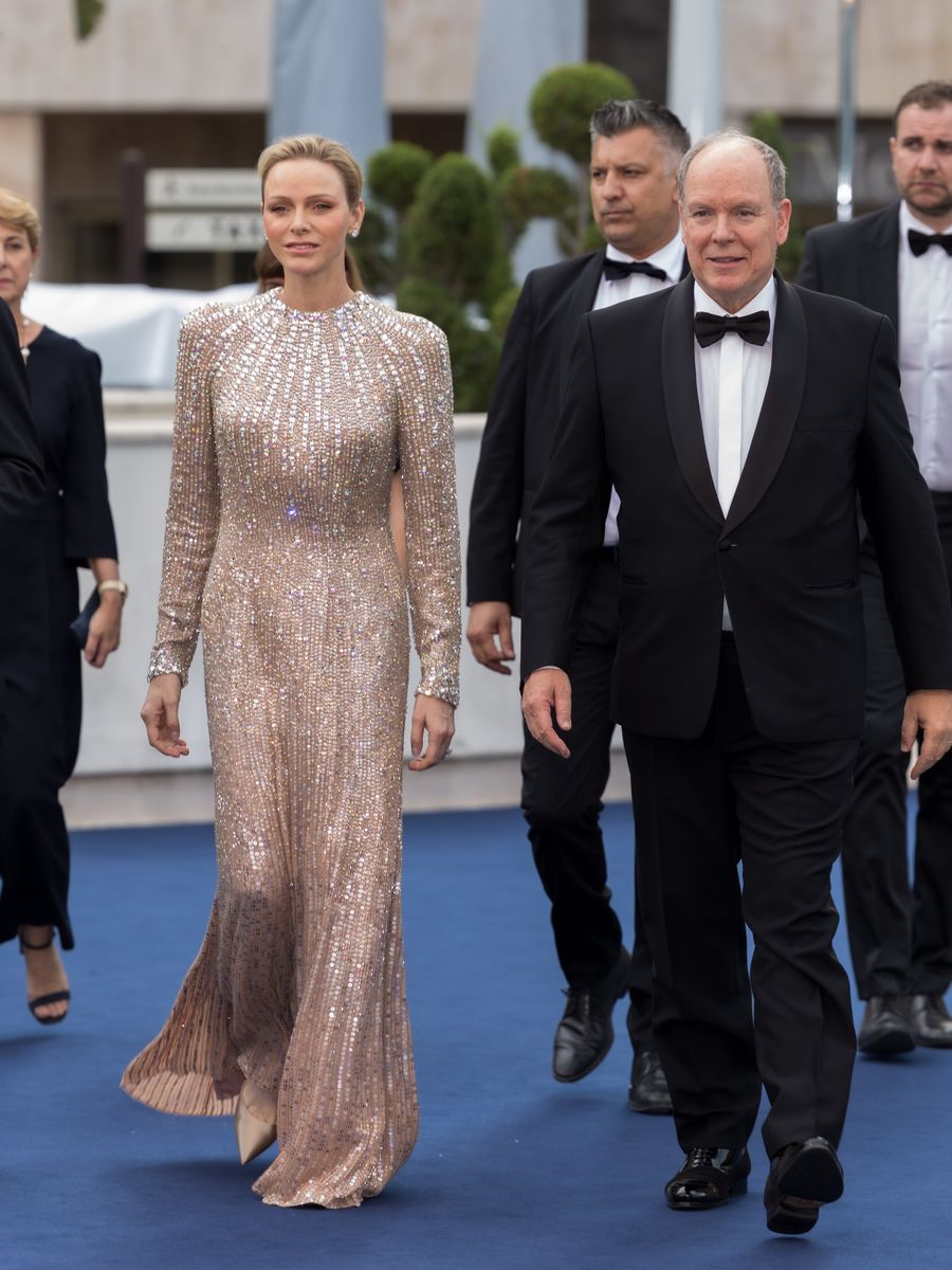 Princess Charlene and Prince Albert II arrive at the closing ceremony of the 65th Monte-Carlo Television Festival, where the Princess dazzled in a crystal-covered Jenny Packham gown.