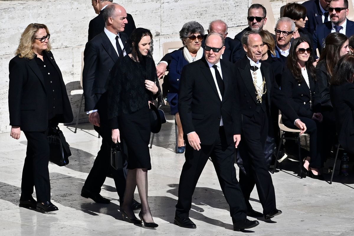Princess Charlene of Monaco and Prince Albert II of Monaco arrive at the funeral of Pope Francis.