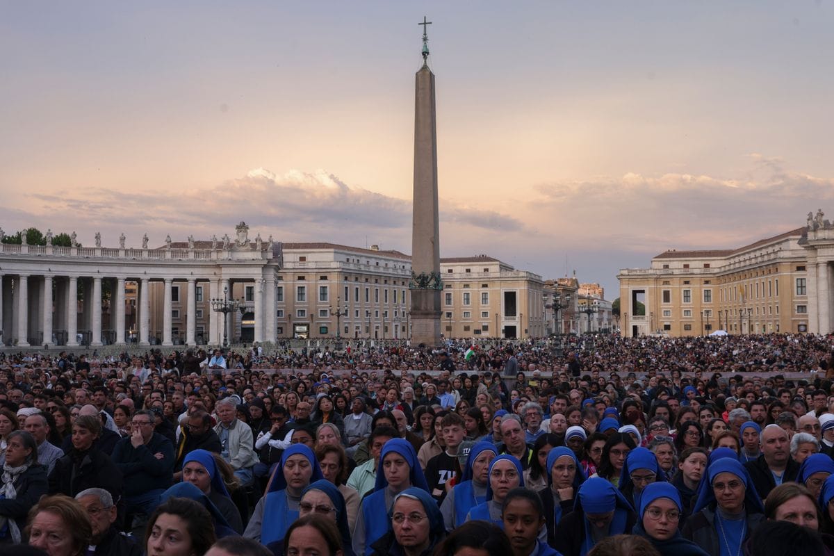 People gather at a Rosary prayer for the late Pope Francis in St. Peter's Square, on April 21, 2025 in Vatican City, Vatican