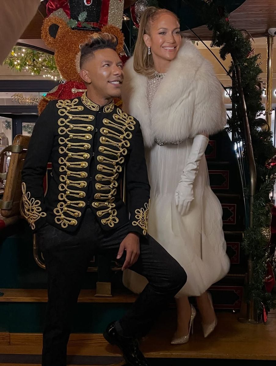 Lopez posed with Mackey with different outfits