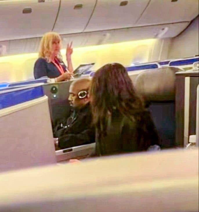 Kanye West and Bianca Censori were spotted on a plane leaving Tokyo, bound for the United States. 

