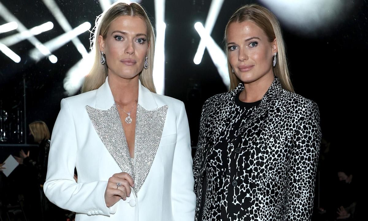 Amelia Spencer and Eliza Spencer attend the Michael Kors Collection