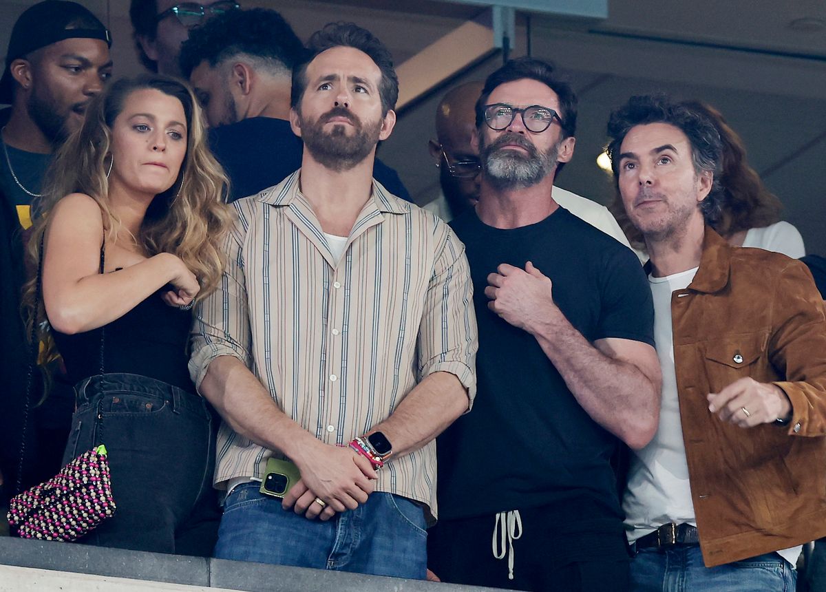 Actress Blake Lively and actors Ryan Reynolds and Hugh Jackman attend a game between the New York Jets and the Kansas City Chiefs at MetLife Stadium on October 01, 2023, in East Rutherford, New Jersey. The Chiefs defeated the Jets 23-20. (Photo by Jim McIsaac/Getty Images)