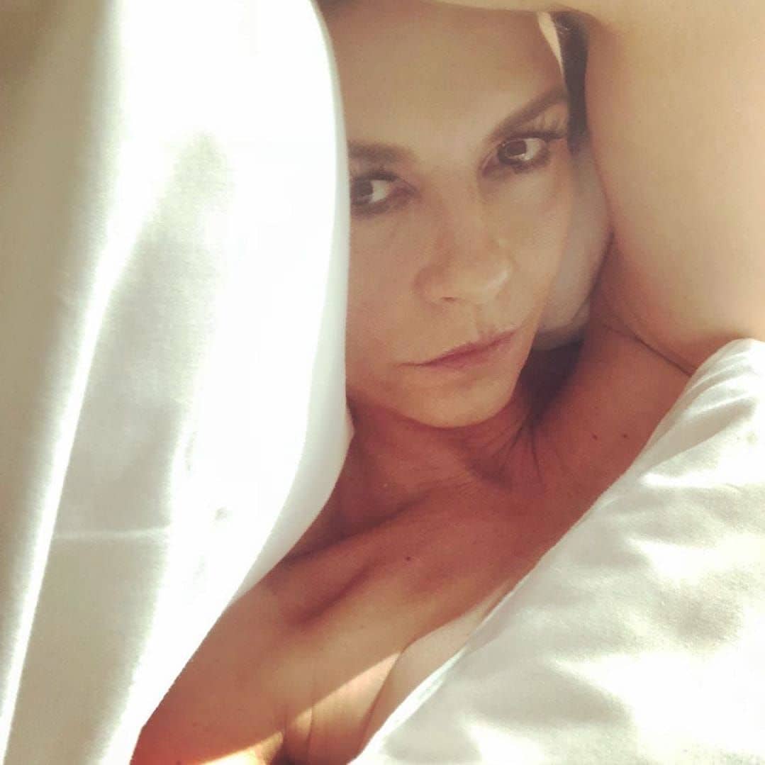 Catherine shared a sultry selfie of herself in bed