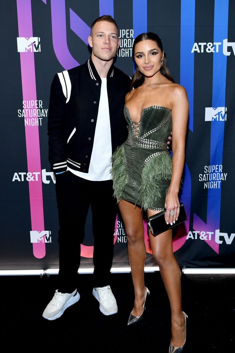 Christian McCaffrey and Olivia Culpo attend AT&T TV Super Saturday Night at Meridian at Island Gardens in Miami