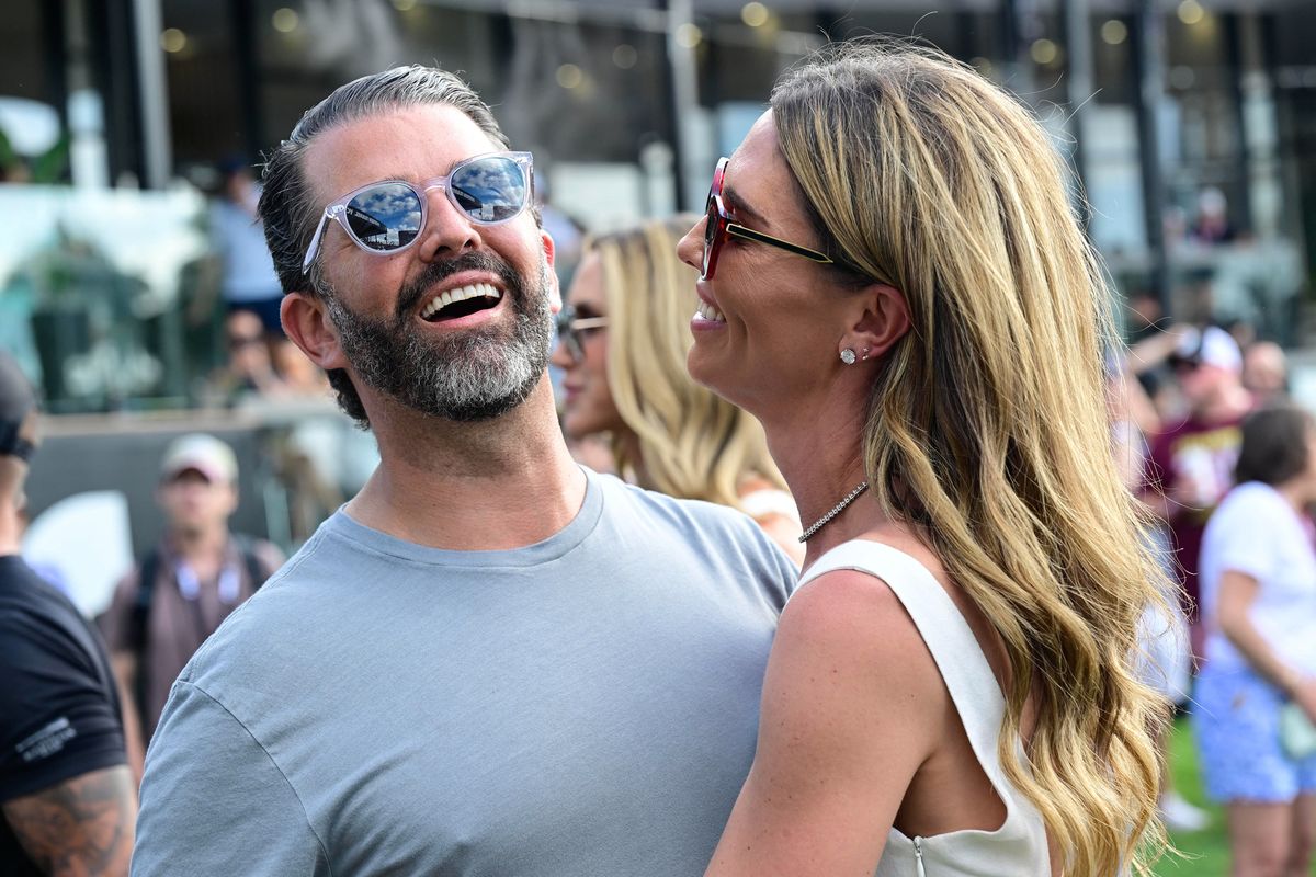 Donald Trump Jr and Bettina Anderson look loved up in Miami concert