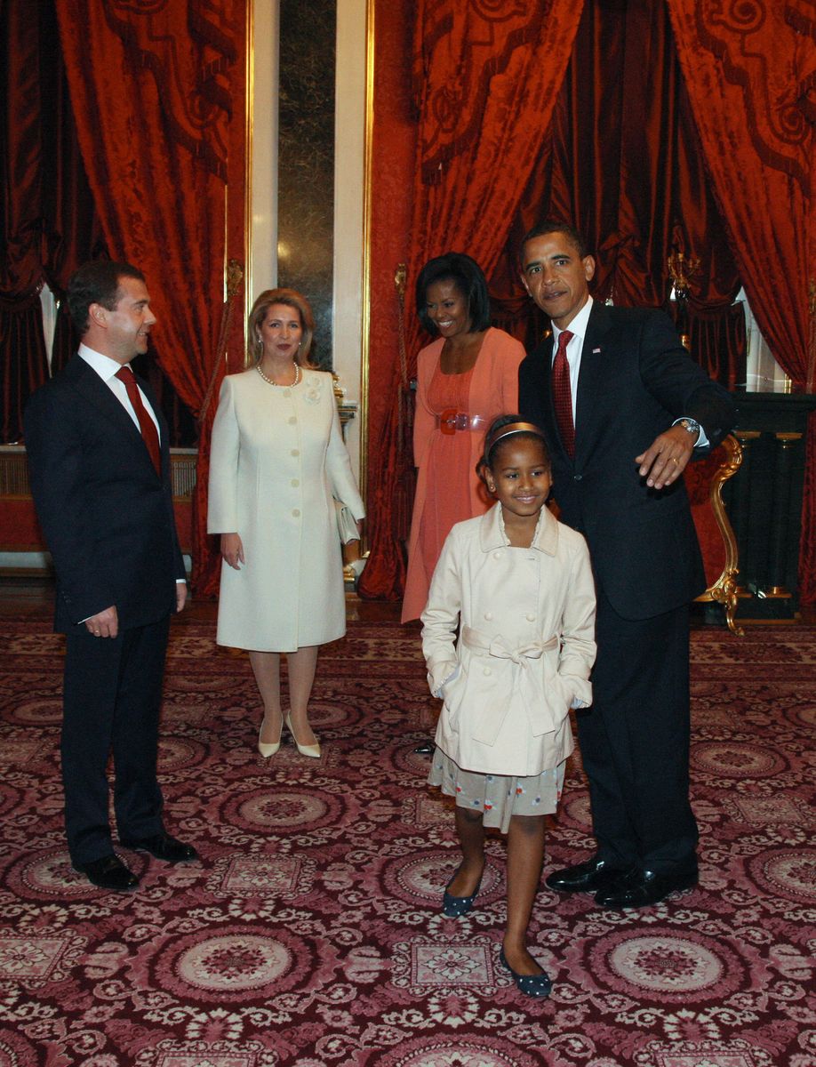 Russian President Dmitry Medvedev (L) and his wife Svetlana (2L) meet with US President Barack Obama, his wife Michelle look and their daughters Sasha and Malia at the Kremlin in Moscow on July 6, 2009. MIKHAIL KLIMENTYEV/AFP via Getty Images)