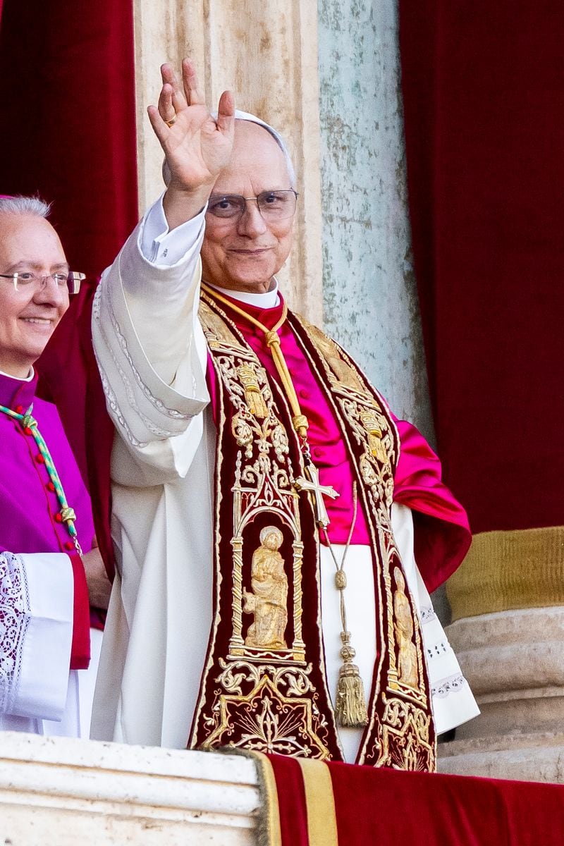 VATICAN CITY, VATICAN - MAY 8: Newly elected Pope Leo XIV, Robert Francis Prevost is seen for the first time from the Vatican balcony on May 8, 2025 in Vatican City, Vatican. White smoke was seen over the Vatican early this evening as the Conclave of Cardinals took just two days to elect Cardinal Robert Francis Prevost, who will be known as Pope Leo  (Leone)  XIV, as the 267th Supreme Pontiff after the death of Pope Francis on Easter Monday. (Photo by Marco Mantovani/Getty Images)