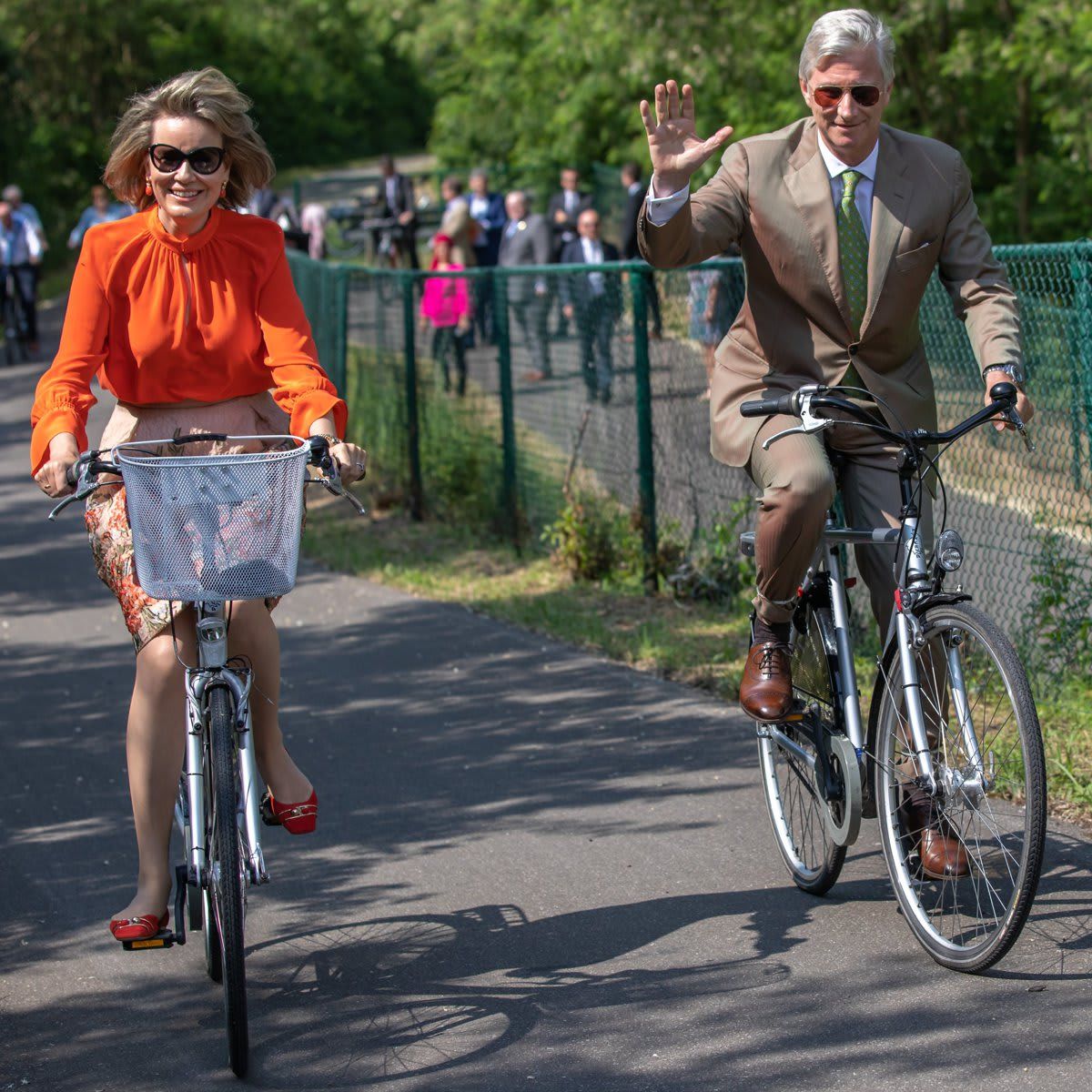 King Philippe of Belgium and Queen Mathilde were all smiles cycling during a visit to Limbourg in 2018.