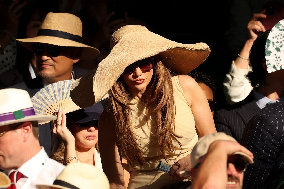 Singer Jennifer Lopez takes her seat as she watches the Gentlemen's Singles final between Jannik Sinner of Italy and Alexander Zverev of Germany on day fourteen of The Championships Wimbledon 2026.