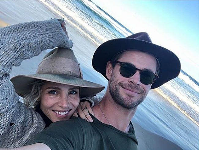 Elsa Pataky and Chris Hemsworth on the beach