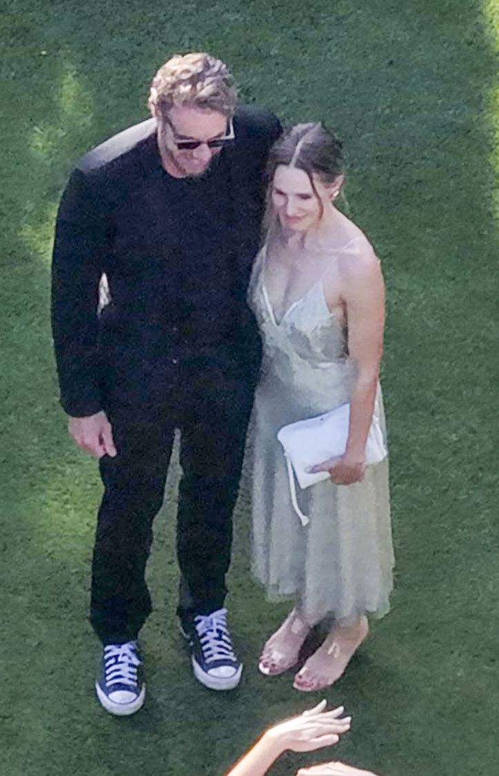 Kristen Stewart and her husband Dax Shephard held each other close