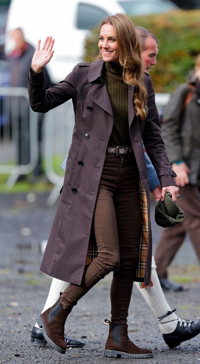 Kate Middleton embraced autumnal tones in a chocolate-brown coat, coordinating trousers and ankle boots during a visit to the Isle of Bute in Scotland.