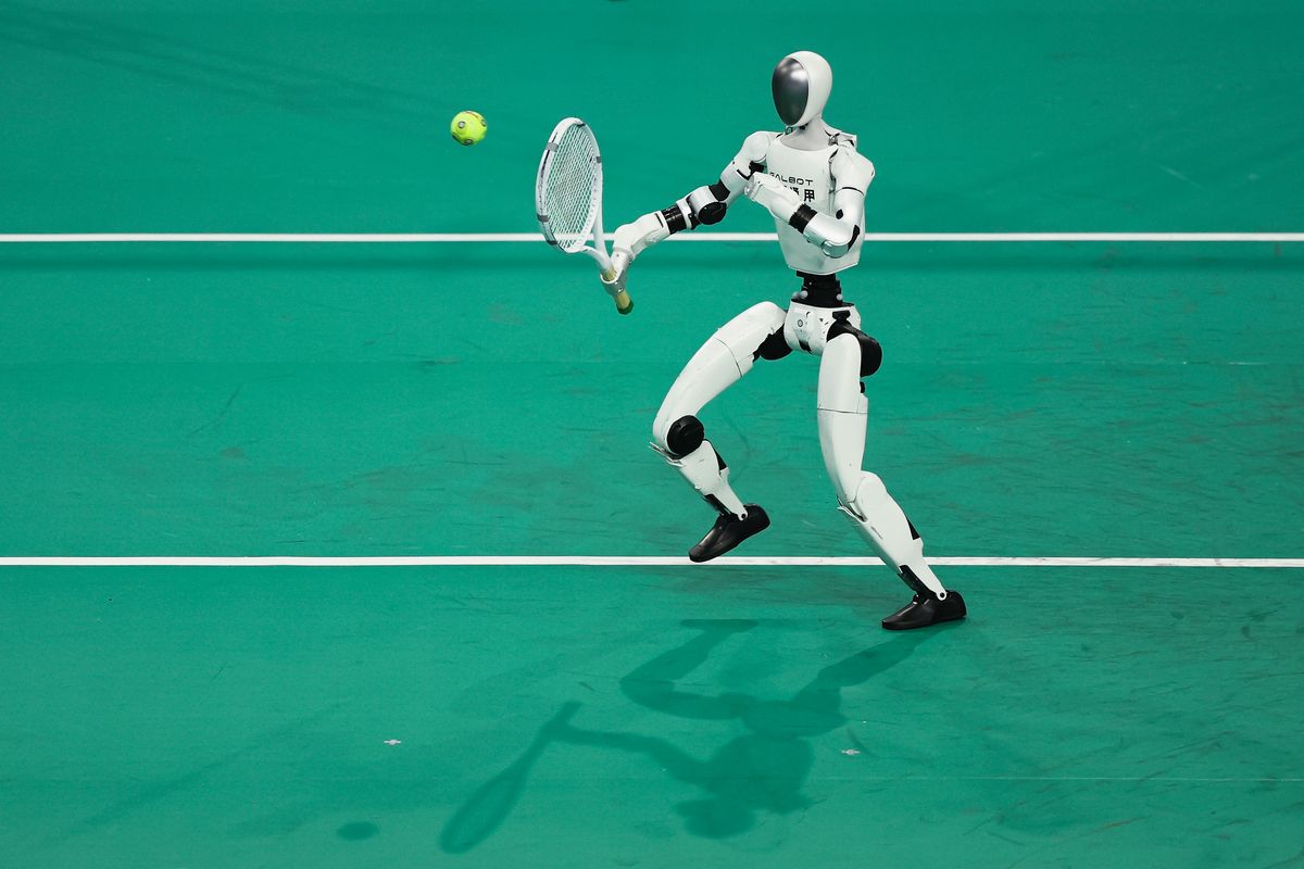 Humanoid robots play tennis
