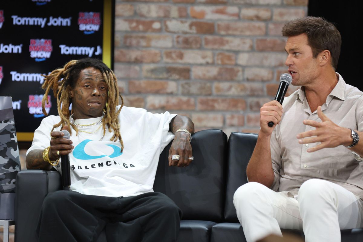 Lil Wayne and Tom Brady seen at the Roommates Show Podcast presented by Tommy John during Fanatics Fest NYC on August 16, 2024