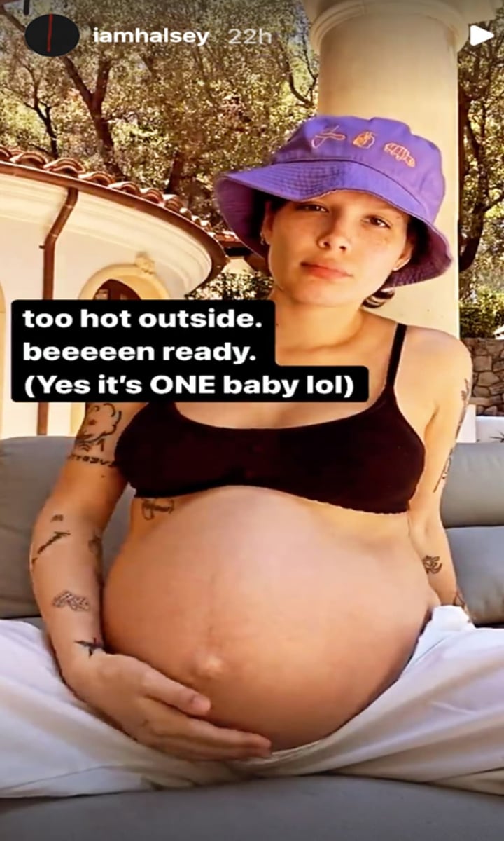 Halsey shows off her growing baby bump