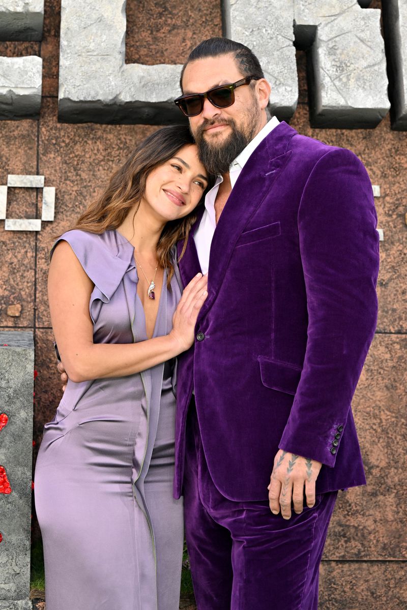 Adria Arjona and Jason Momoa attend the world premiere of "A Minecraft Movie" at Cineworld Leicester Square on March 30, 2025 in London, England. 