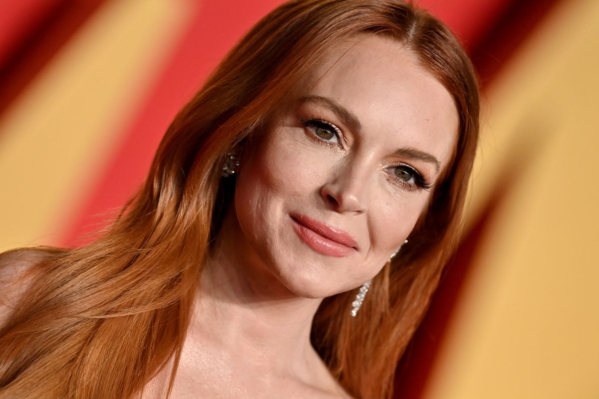 Lindsay Lohan is back to the same signature red hair she had at the 2024 Vanity Fair Oscar Party.