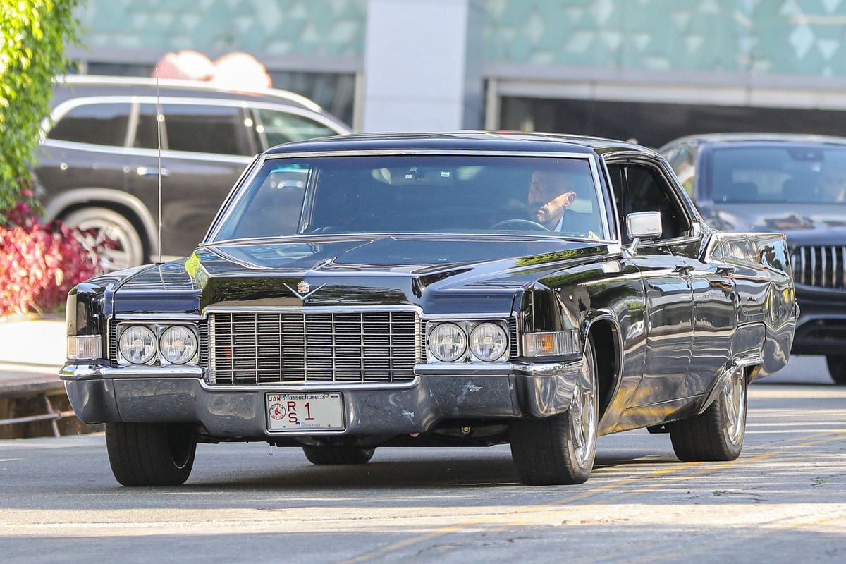 Affleck was photographed driving his vintage Cadillac, now converted into an electric vehicle
