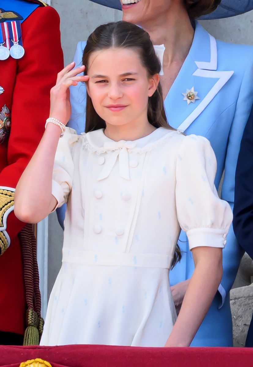 Princess Charlotte wore her hair in soft waves and a half-up style with a white bow for Trooping the Colour 2026, a look that echoed Kate Middleton's signature hairstyle.