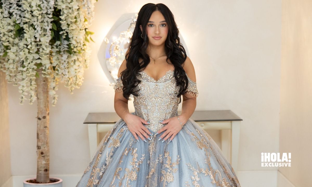 Gia radiated in her dreamy powder-blue and gold gown, a true princess moment at her quinceañera.