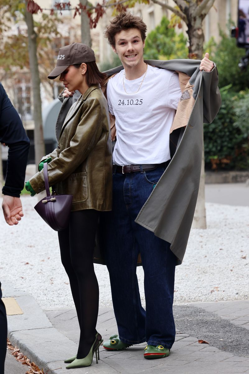 Cruz Beckham, stepping out in Paris with his girlfriend, Jackie Apostel, in a crisp white T-shirt boldly printed with the date 24.10.25. 