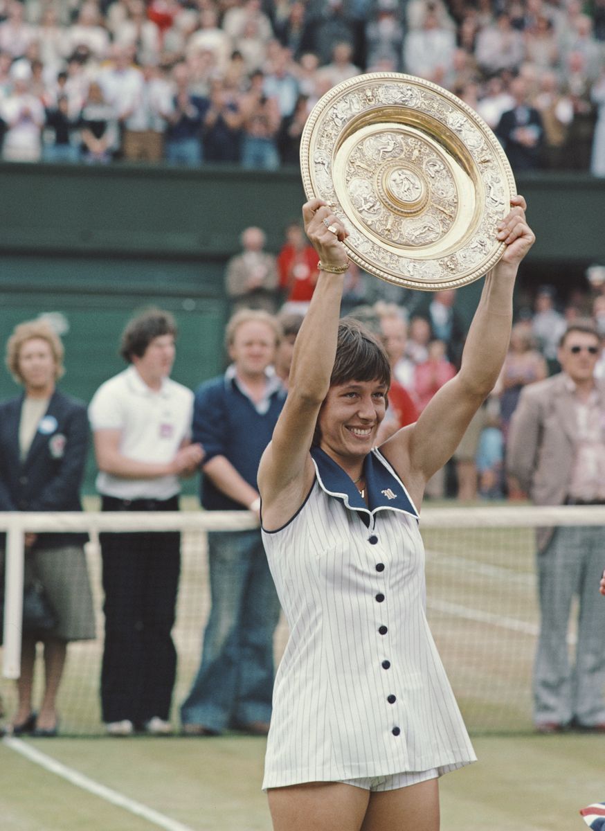 Martina Navratilova holds the Rosewater Plate aloft after winning the Ladies Singles Final match against Chris Evert at the Wimbledon 1978