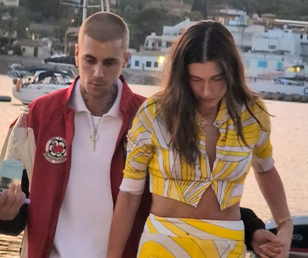 Justin and Hailey Bieber holding hands in Malloca