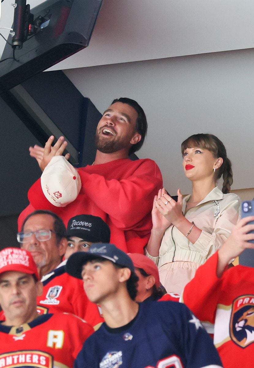 Travis Kelce, left, and Taylor Swift react as the Edmonton Oilers and the Florida Panthers play during the first period in Game Four of the 2025 Stanley Cup Final at Amerant Bank Arena on June 12, 2025 in Sunrise, Florida. (Photo by Bruce Bennett/Getty Images)