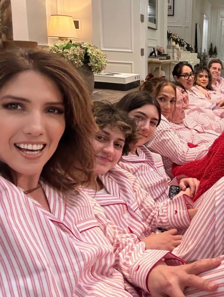 Jennifer Lopez ditched sequins for pink pajamas on Christmas eve, and the look was stylish and comfy