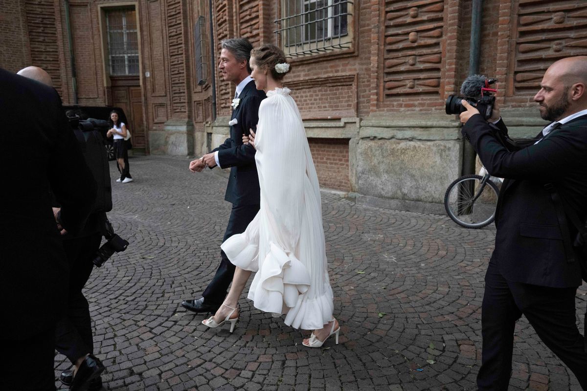 Eva Herzigová wore a boho-inspired Lanvin midi wedding dress for the ceremony at Turin's Church of San Vito.